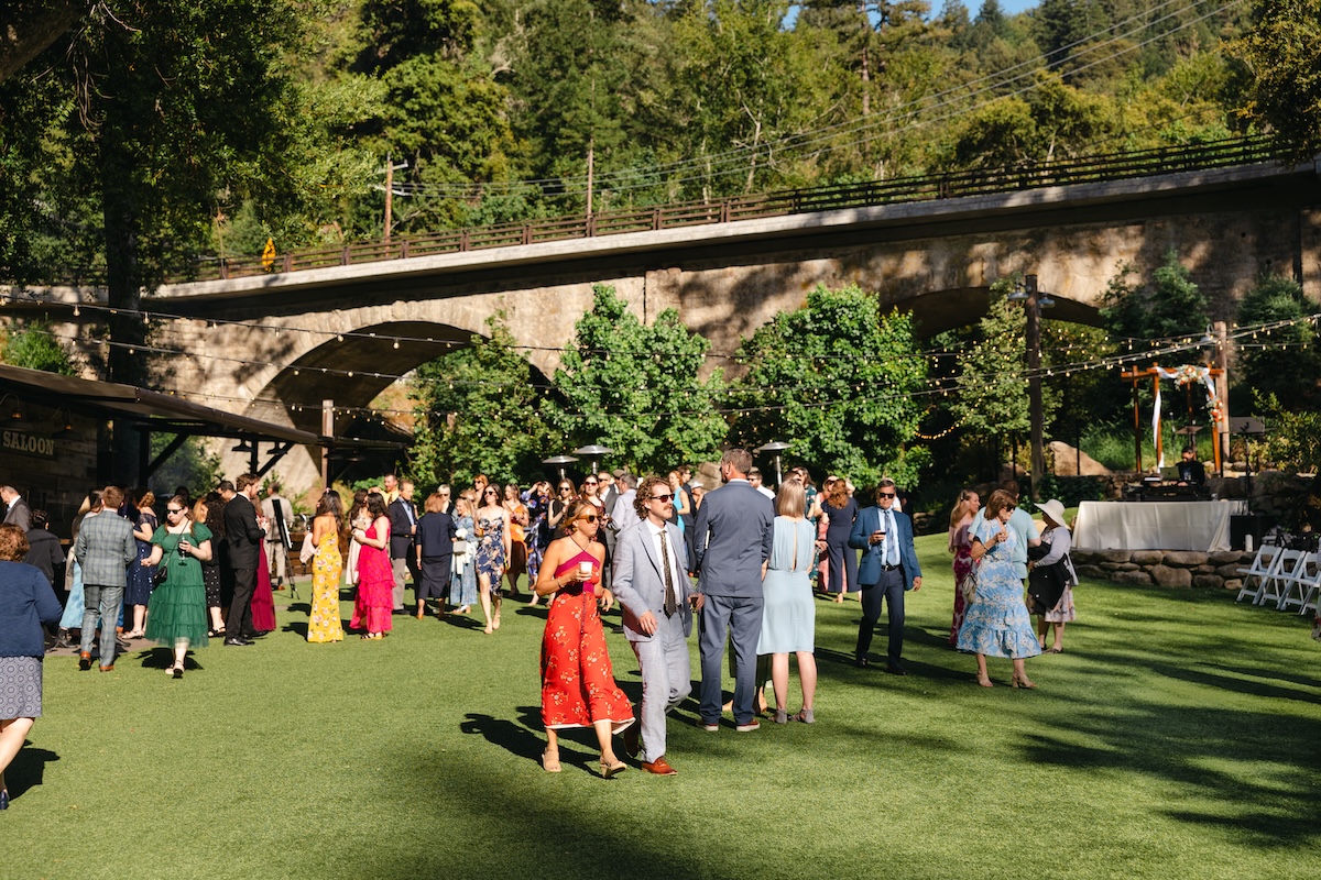During cocktail hour guests mingle at Long Bridge in Saratoga Springs California.