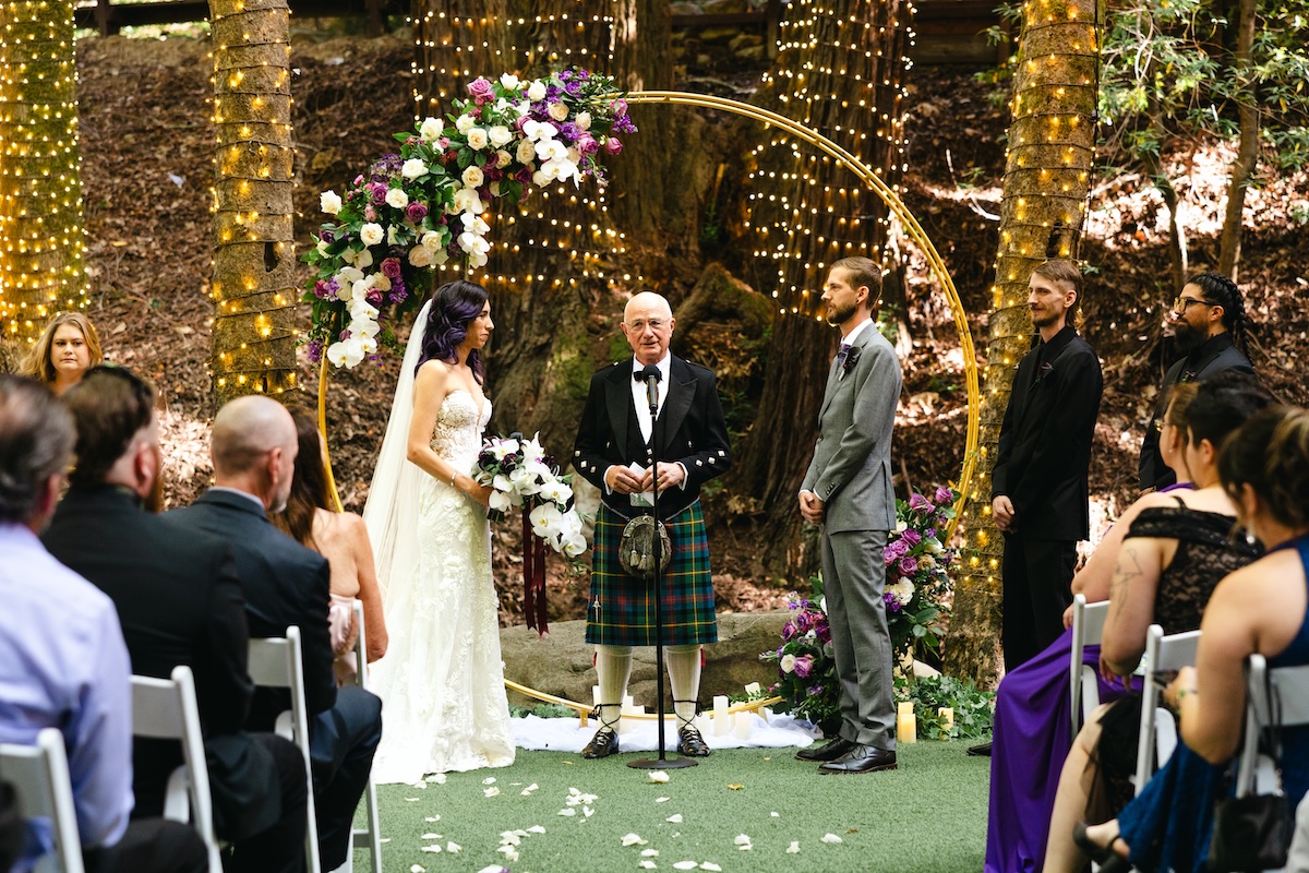 Wedding ceremony at Cathedral Grove in Saratoga Springs California.