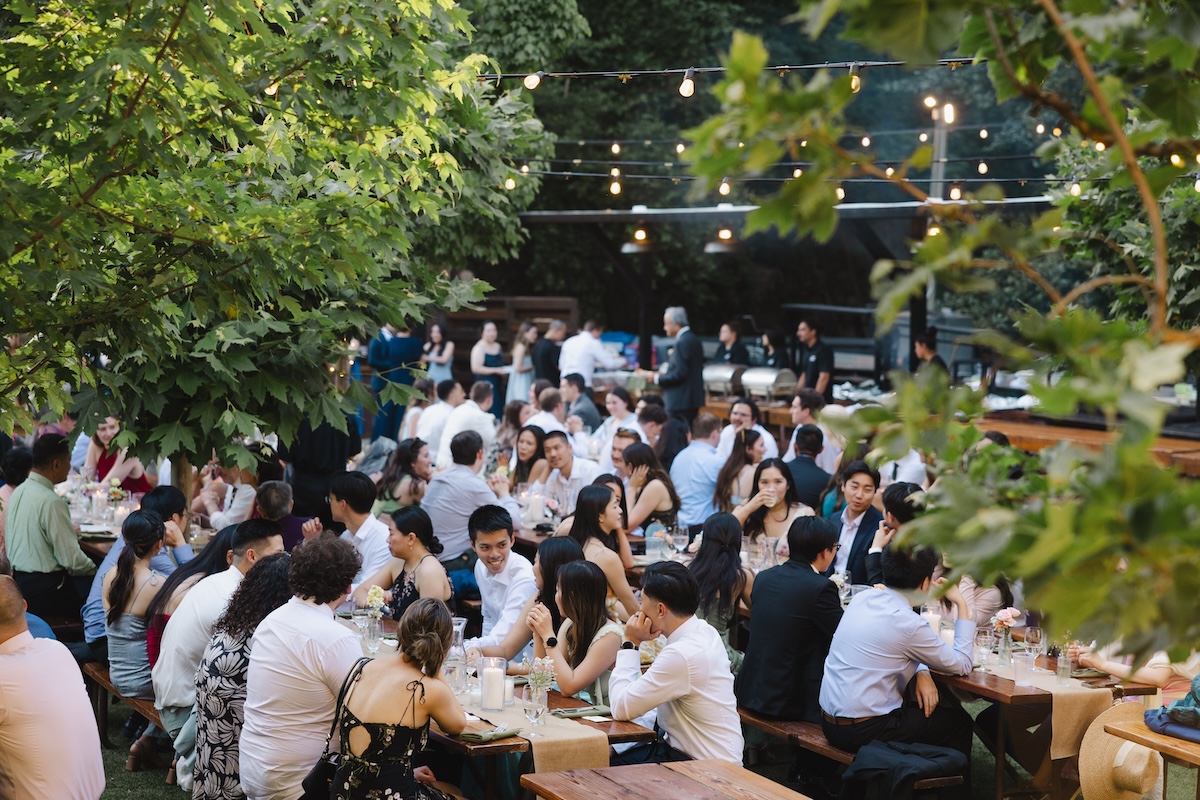Dinner hour under tree canopies at Long Bridge at Saratoga Springs California.