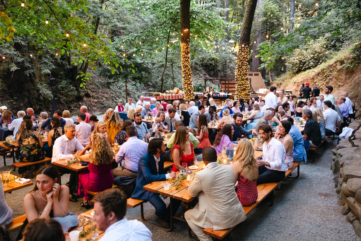 The picnic tables fill up at dinner hour in Cathedral Grove at Saratoga Springs California.