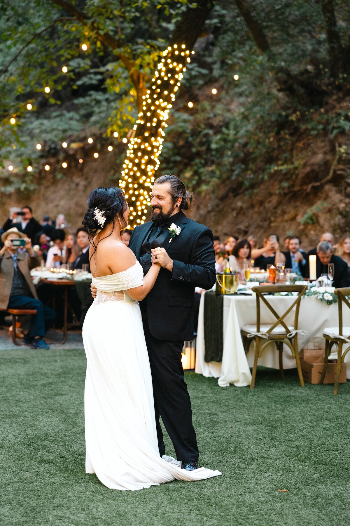 The newlyweds first dance at an all outdoor woodsy venue Cathedral Grove, Saratoga Springs California.